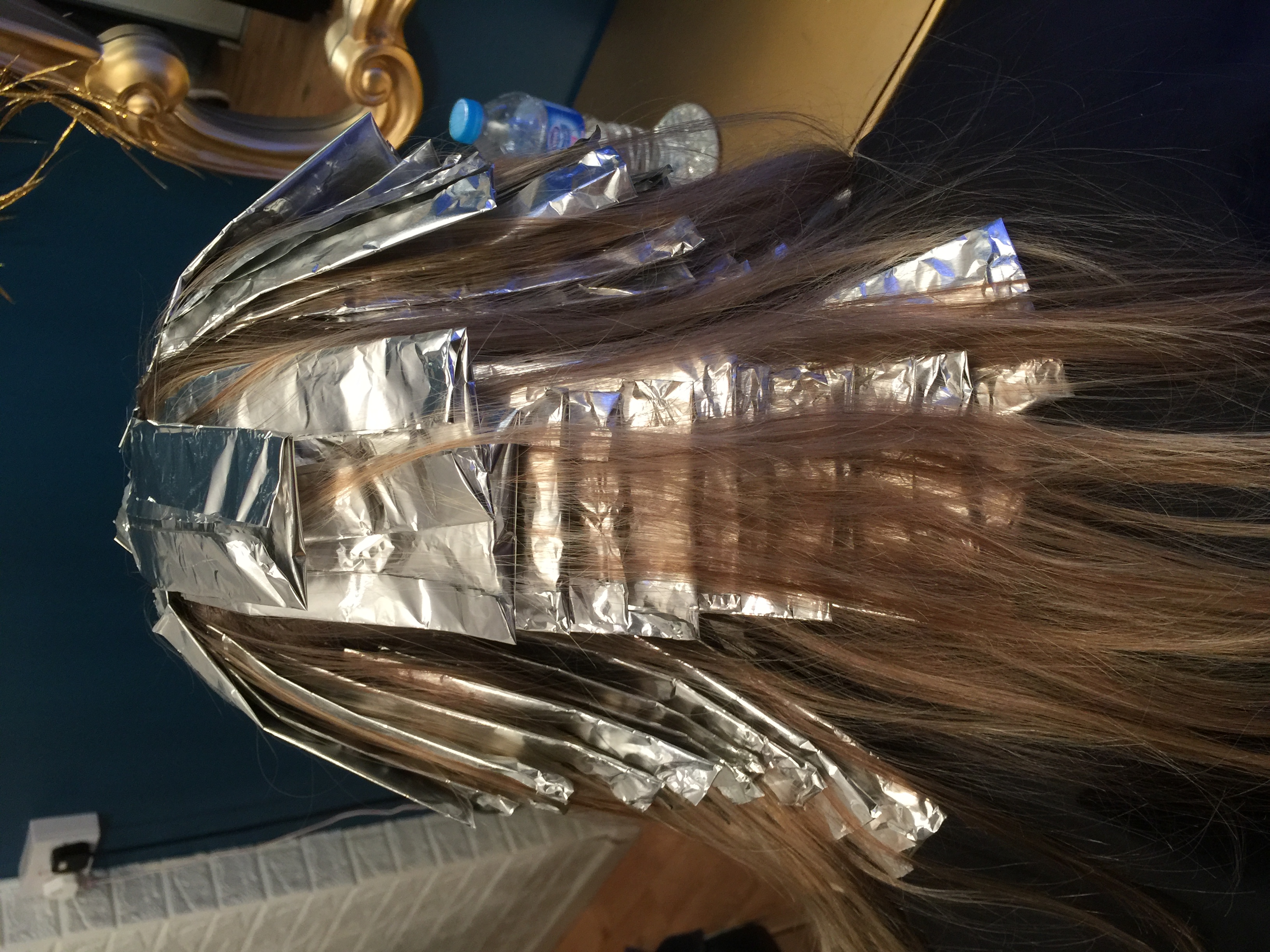 Hair foils during professional coloring process